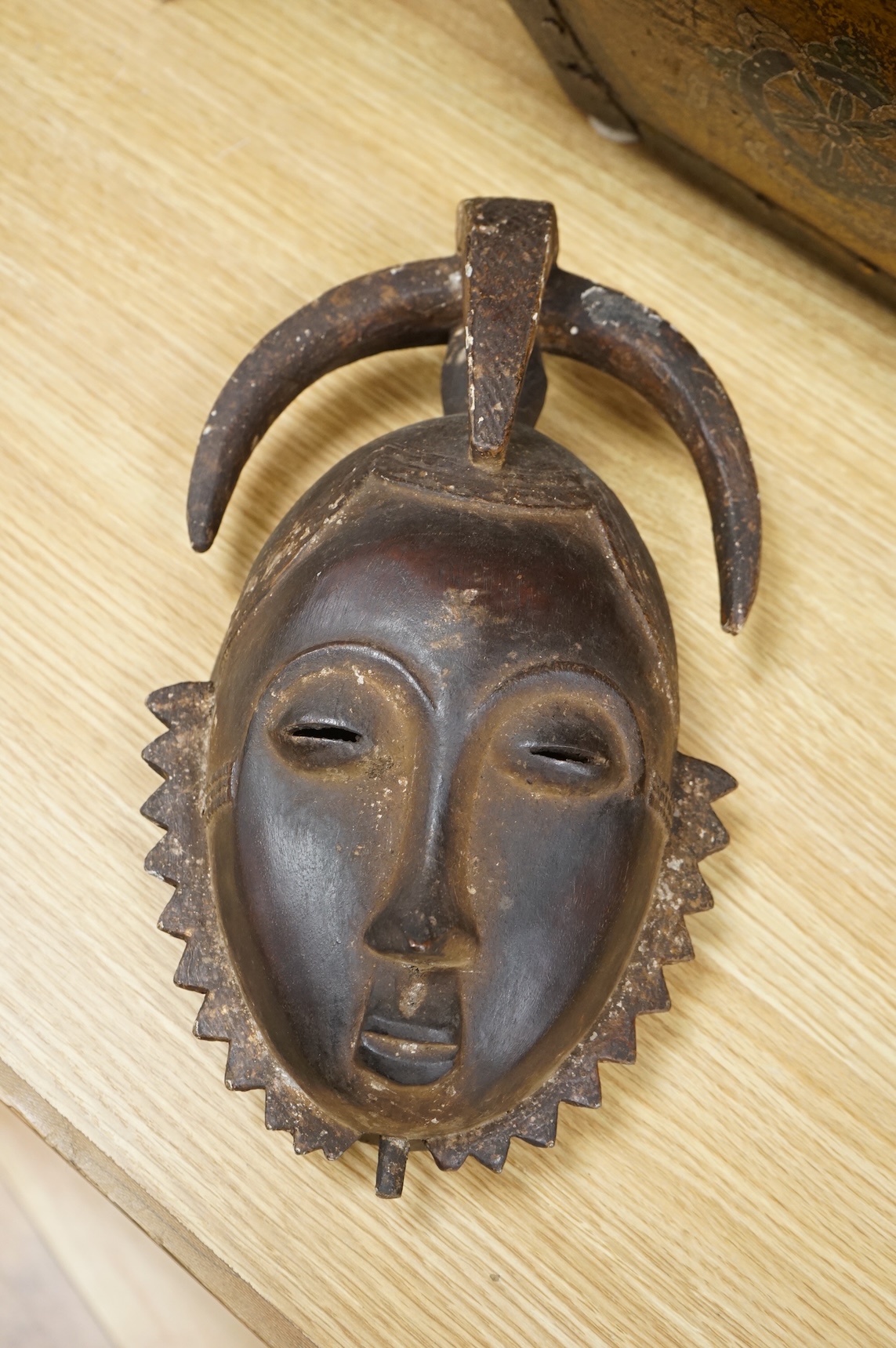 A Yaure carved African mask, from the Ivory Coast, 32cm high